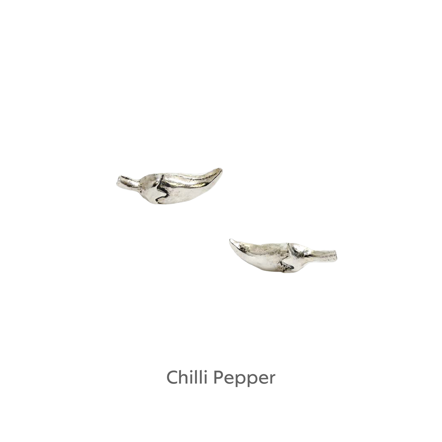 a pair of silver birds on a black background