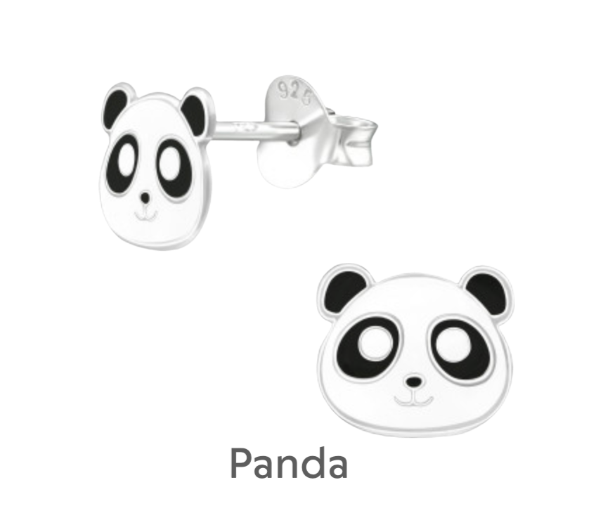 a pair of panda bear earrings on a black background