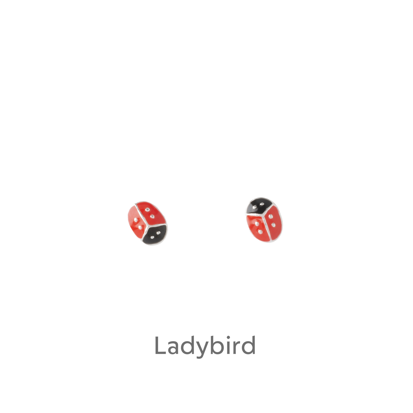 a pair of red and black earrings on a black background