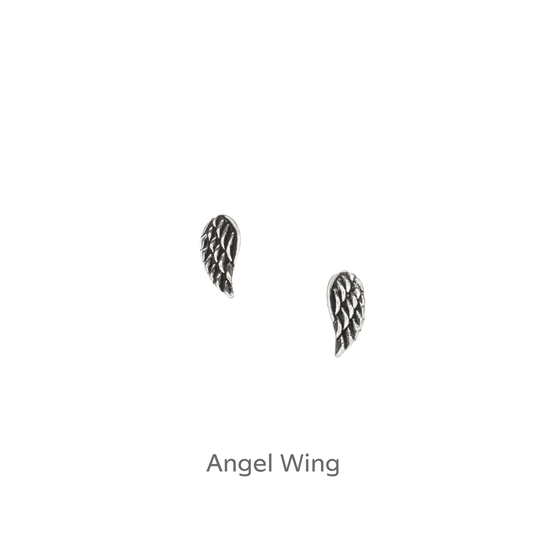 a pair of silver angel wings on a black background