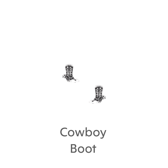 a pair of cowboy boots on a black background