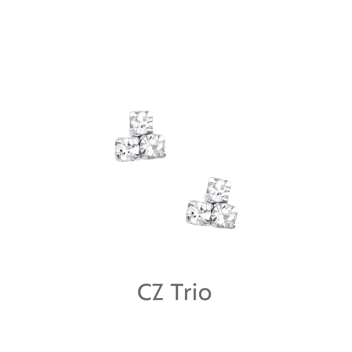 a pair of diamond earrings on a black background