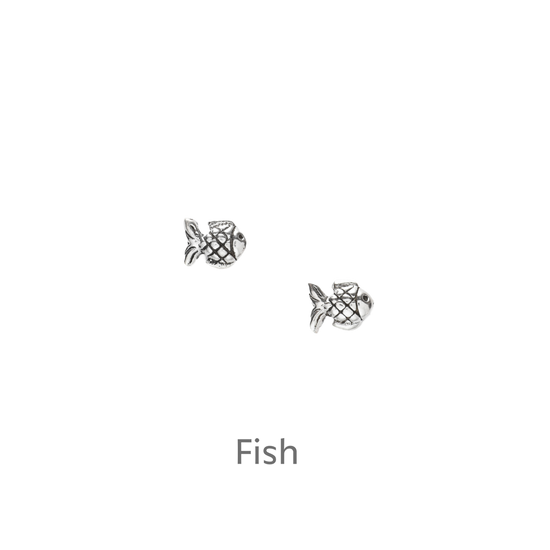 a pair of fish earrings on a black background