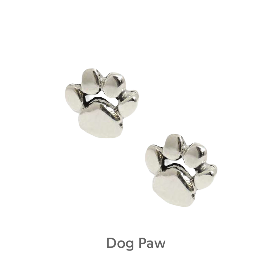 a pair of silver paw prints on a black background