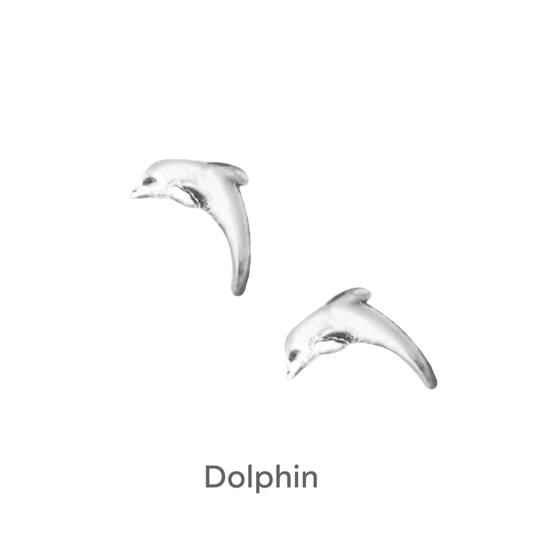 a pair of white dolphins are shown against a black background