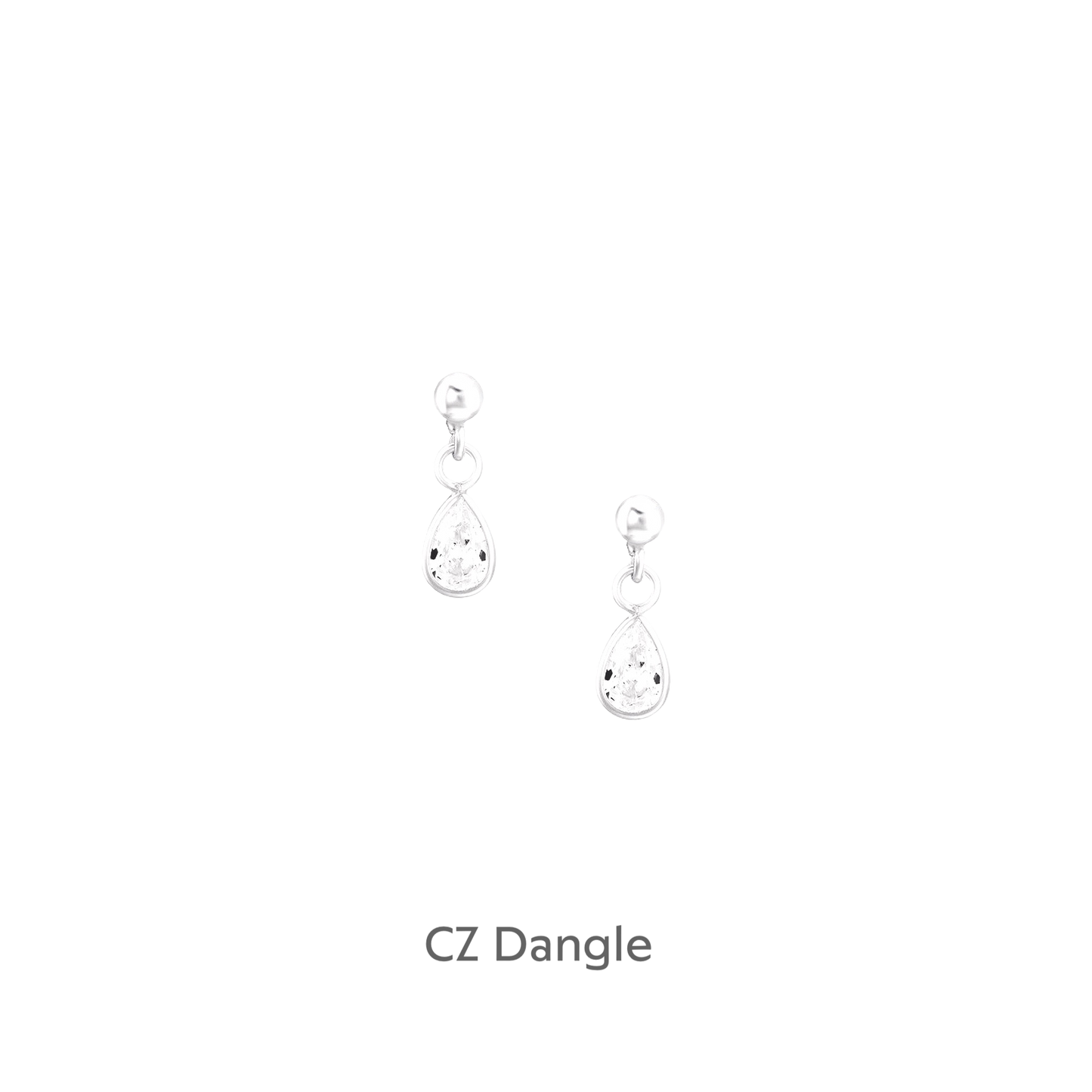 a pair of earrings on a black background