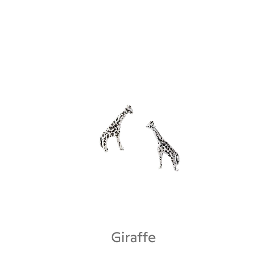 a pair of giraffes on a black background