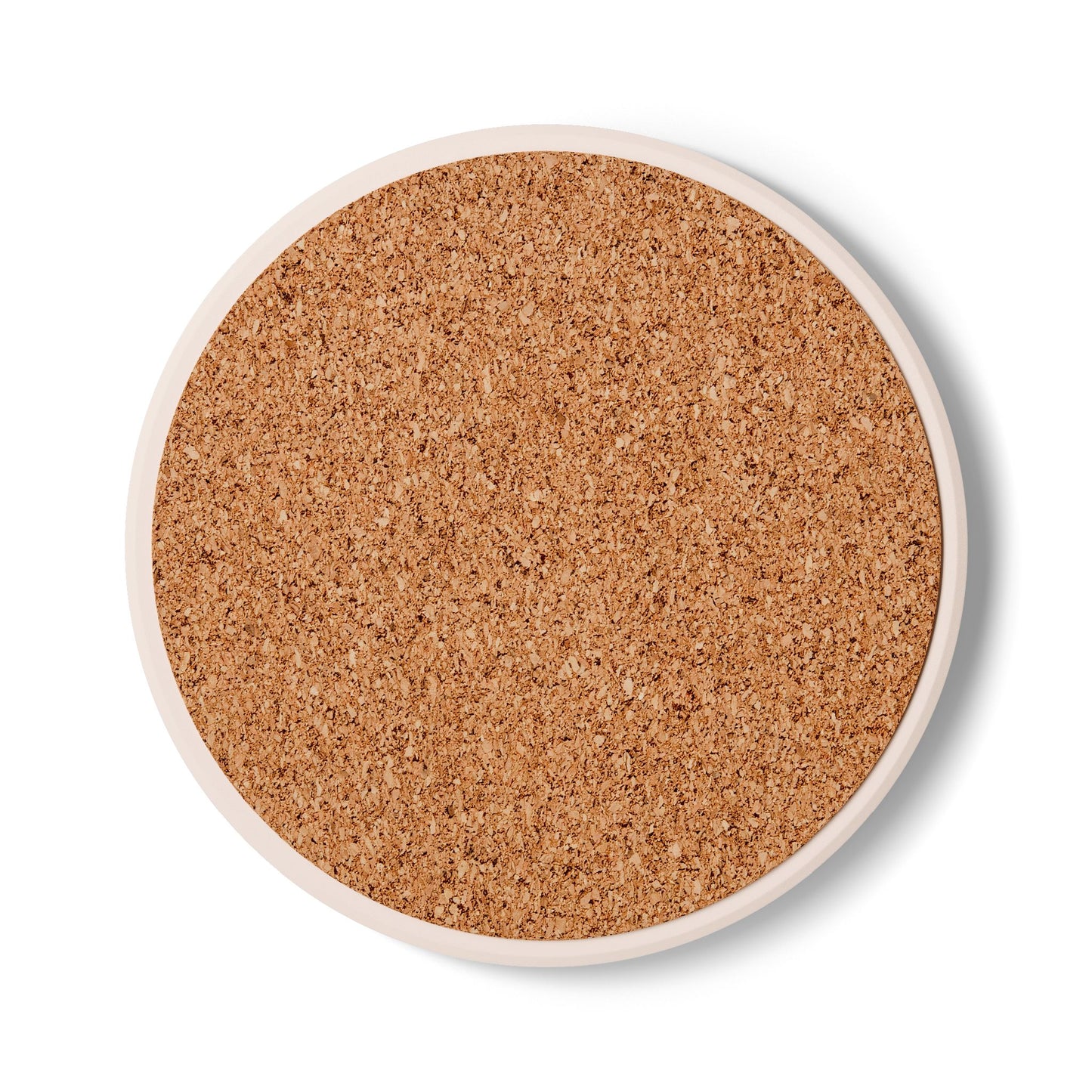 a round cork coaster on a white background