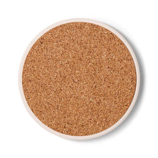a round cork coaster on a white background