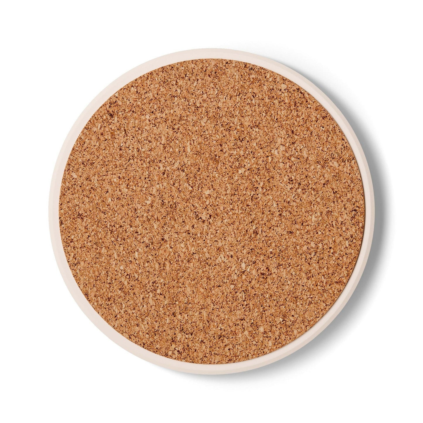 a round cork coaster on a white background
