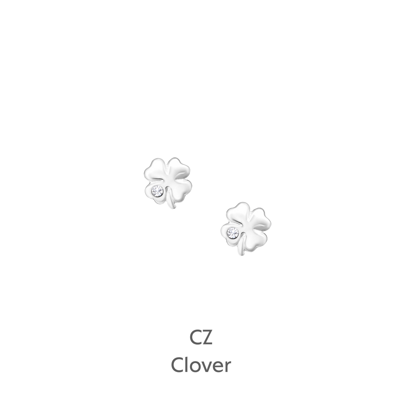 a pair of white flower earrings on a black background